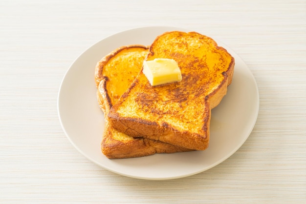 French toasted with butter and honey