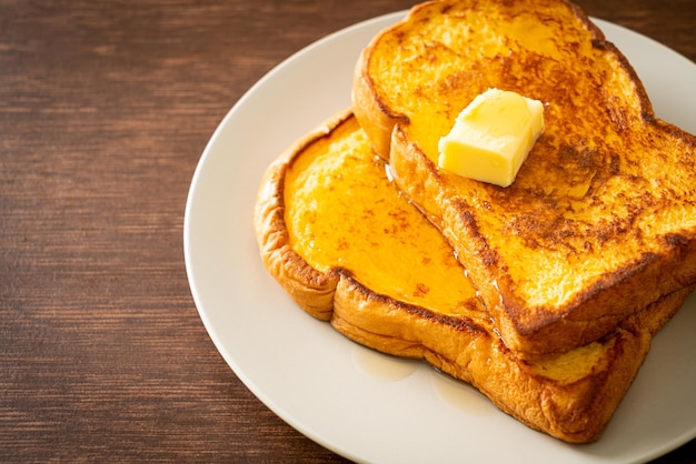 French toasted with butter and honey