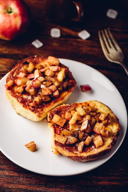 French toasts with chopped apple caramelized with cinnamon