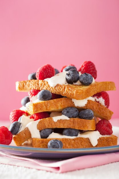 French toasts with creme fraiche and berries for breakfast