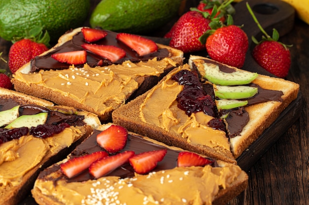 French toasts with peanut butter and fruit pieces