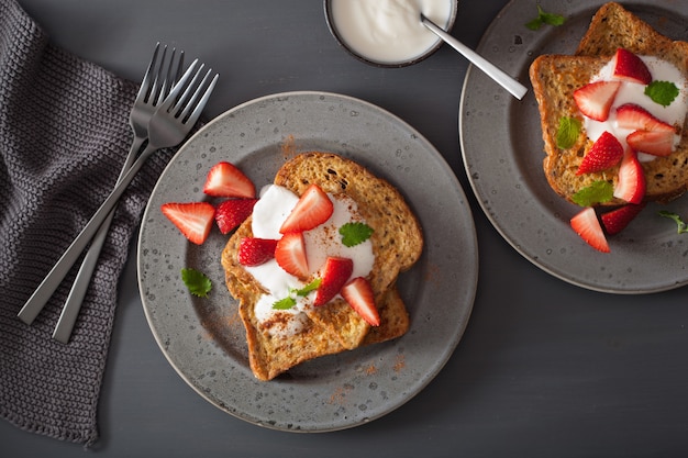 French toasts with yogurt and strawberries for breakfast