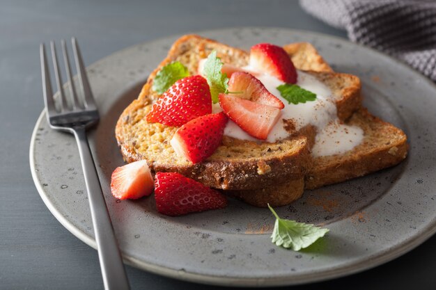 French toasts with yogurt and strawberries for breakfast