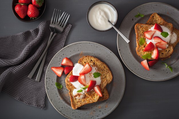 French toasts with yogurt and strawberries for breakfast