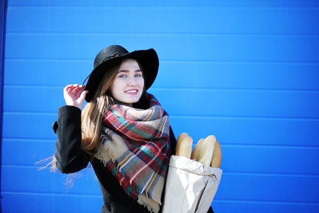 French woman for a walk in grocery stores outdoor