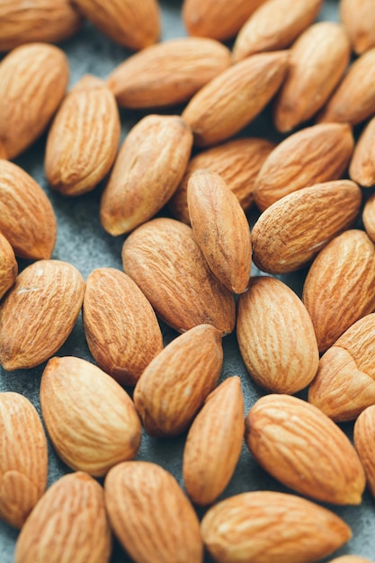 Fresh almond nuts Food background Top view Toned