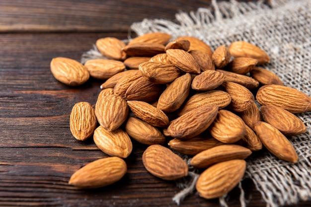 Fresh almonds on the wooden table