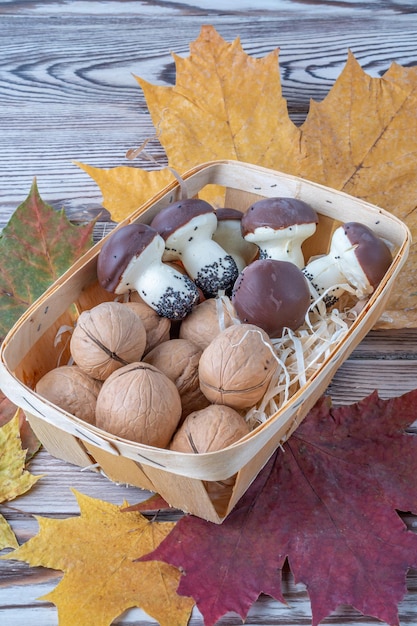 Fresh apples on the background of maple leaves fruit on the background antique wooden background