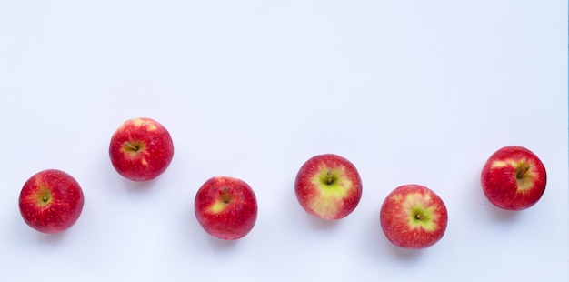 Fresh apples on white wall. Top view