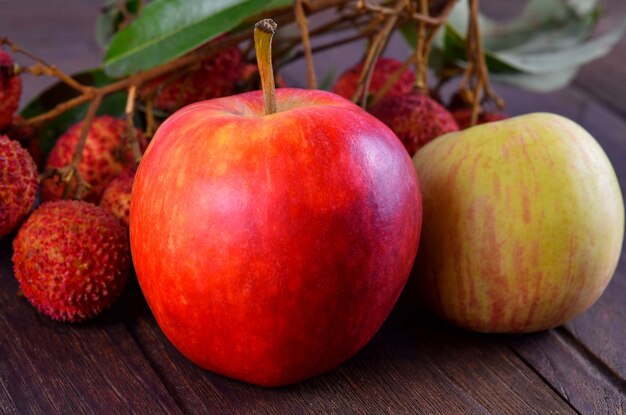 Fresh apples on wooden table