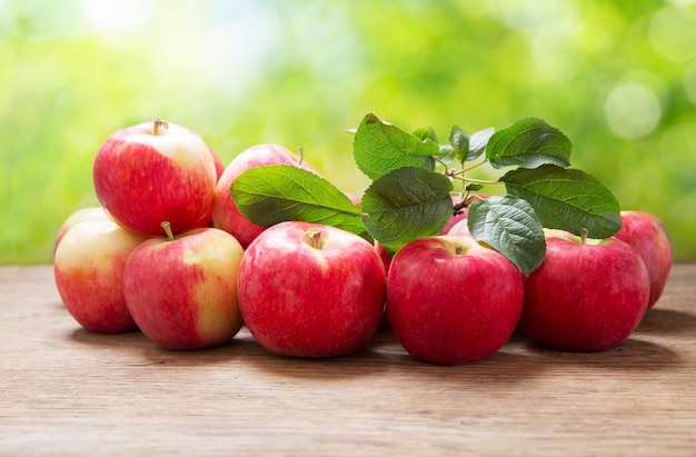 Fresh apples on a wooden table