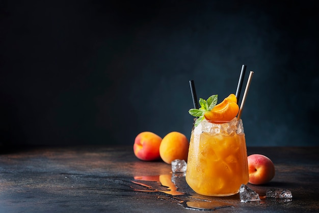 Fresh apricot cocktail with ice and mint