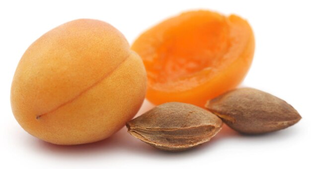 Fresh apricots over white background