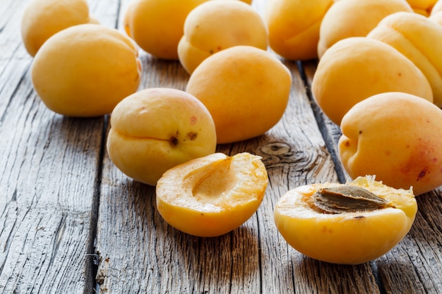 Fresh apricots on a wooden table