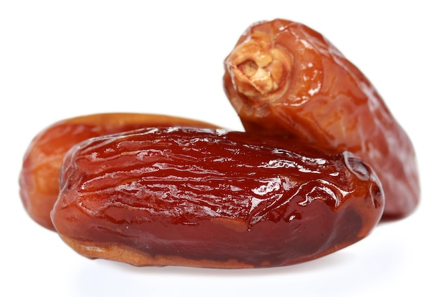 Fresh Arabian Dates over white background