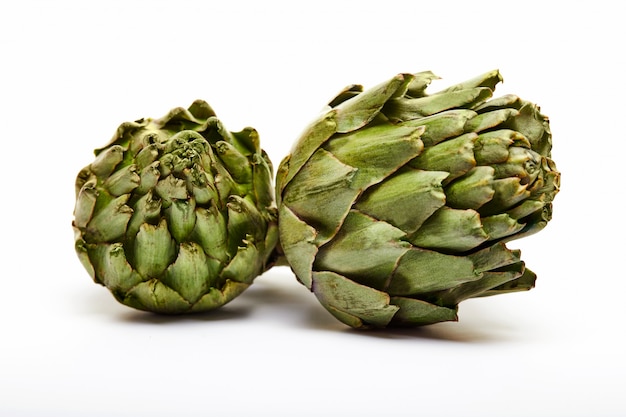 Fresh artichokes isolated on a white surface