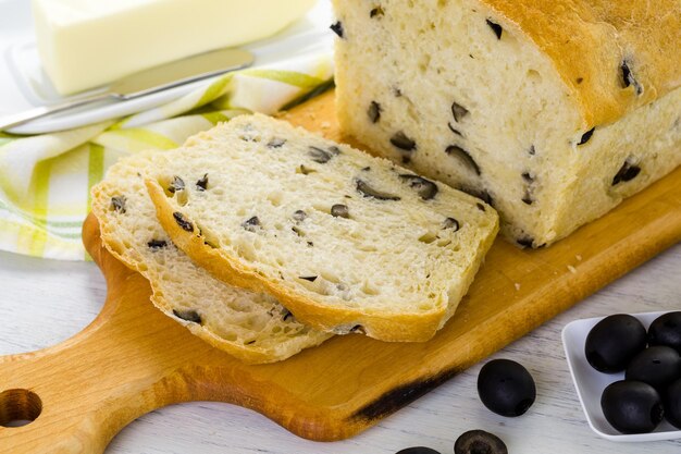 Fresh artisan sourdough olive bread on the table.