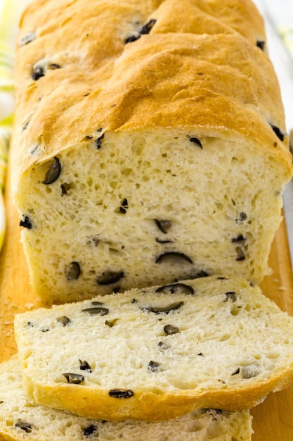 Fresh artisan sourdough olive bread on the table.