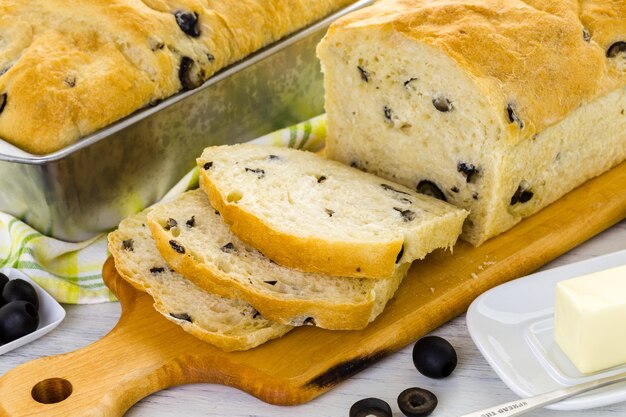 Fresh artisan sourdough olive bread on the table.