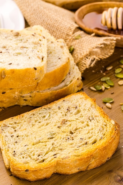 Fresh artisan sourdough seeded bread on the table.