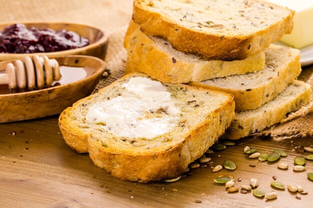 Fresh artisan sourdough seeded bread on the table.