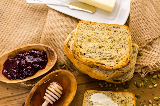 Fresh artisan sourdough seeded bread on the table.