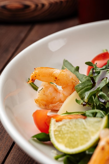 Fresh arugula salad with shrimp