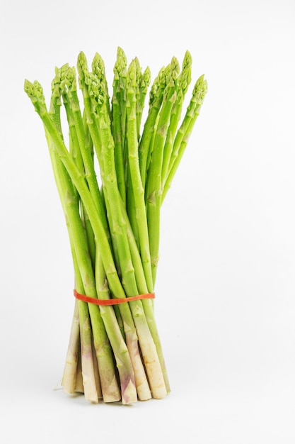 Fresh asparagus isolated on white background