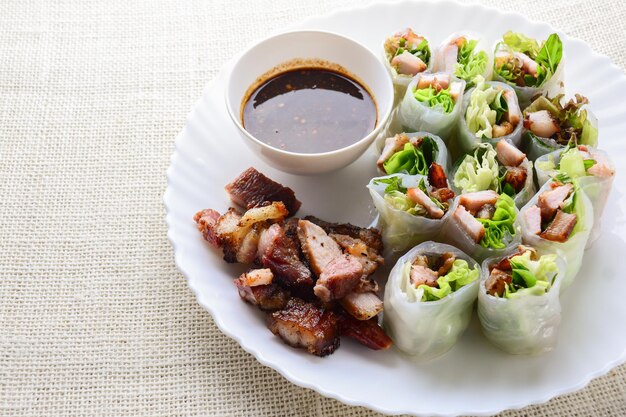 Fresh assorted Asian spring rolls with grilled pork fresh vegetable Healthy and delicious dish