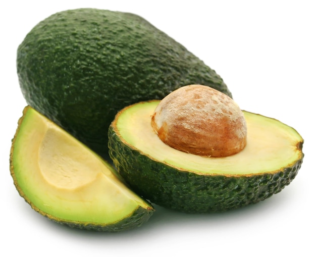 Fresh avocado whole and sliced with seed