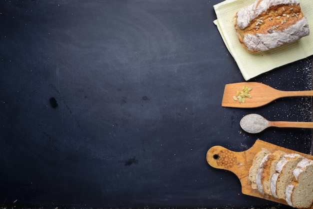 fresh baked bread on black background