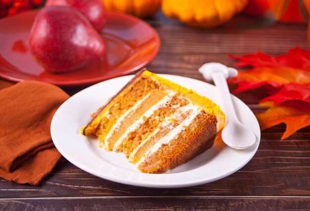 Fresh baked homemade piece of carrot cake on the plate. A