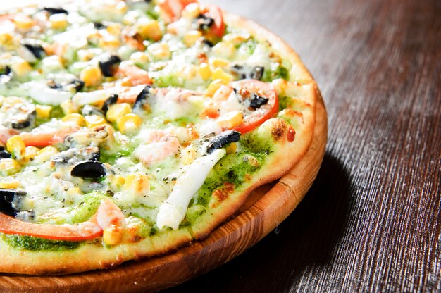 Fresh baked pepperoni pizza, shallow depth of field.