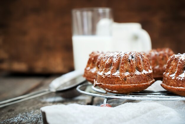 Fresh Baked Sweet Cake with Icing Sugar and Milk