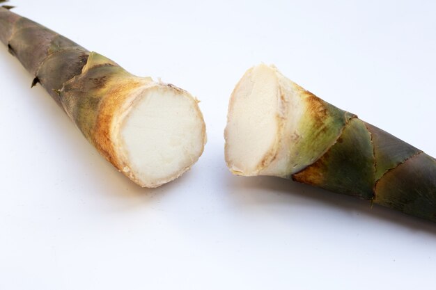 Photo fresh bamboo shoots white background.