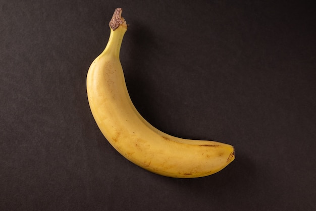 Fresh banana on black background