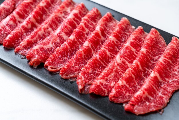 fresh beef raw sliced with marbled texture