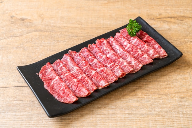 fresh beef raw sliced with marbled texture