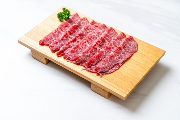 fresh beef raw sliced with marbled texture