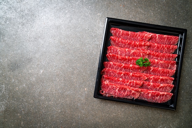 fresh beef raw sliced with marbled texture