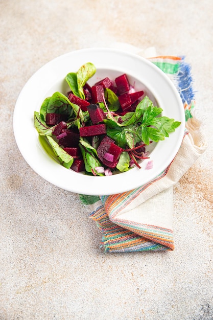 Fresh beet salad beetroot onion lettuce ready to eat portion dietary healthy meal food diet snack