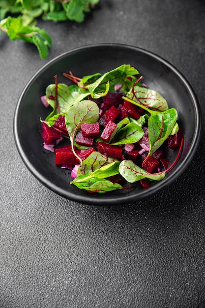 Fresh beet salad beetroot onion lettuce ready to eat portion dietary healthy meal food diet snack