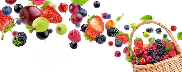 Fresh berries in basket isolated on white background