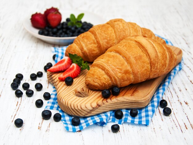 Fresh berries and croissant