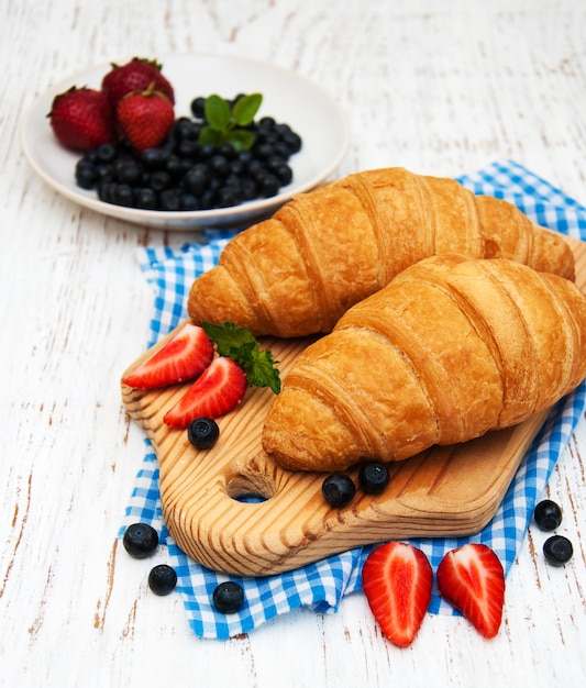 Fresh berries and croissant