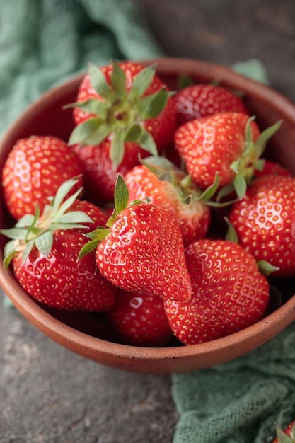 Fresh berries in a wooden bowl