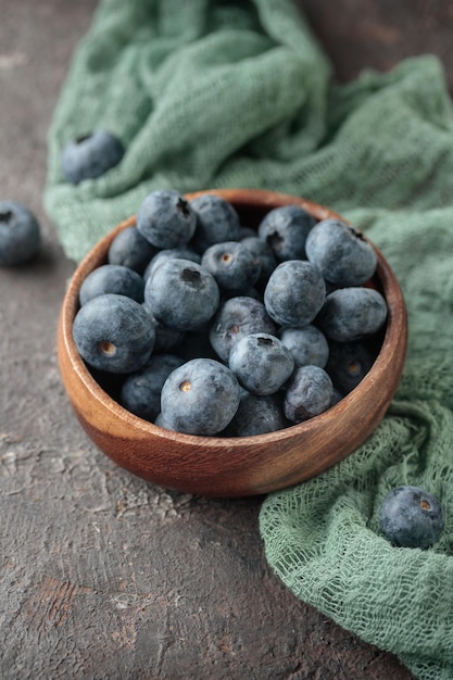 Fresh berries in a wooden bowl