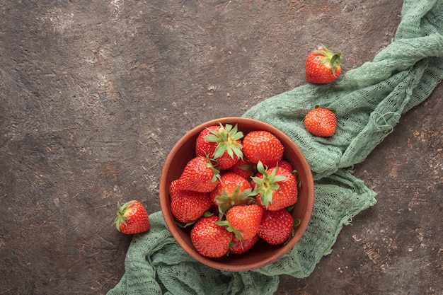 Fresh berries in a wooden bowl