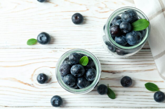 Fresh berry concept with blueberry on white wooden table