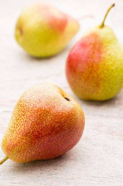 Fresh bio pears on a bright background